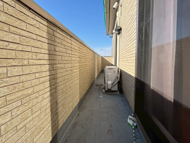 光の森　店舗付き住宅のバルコニー