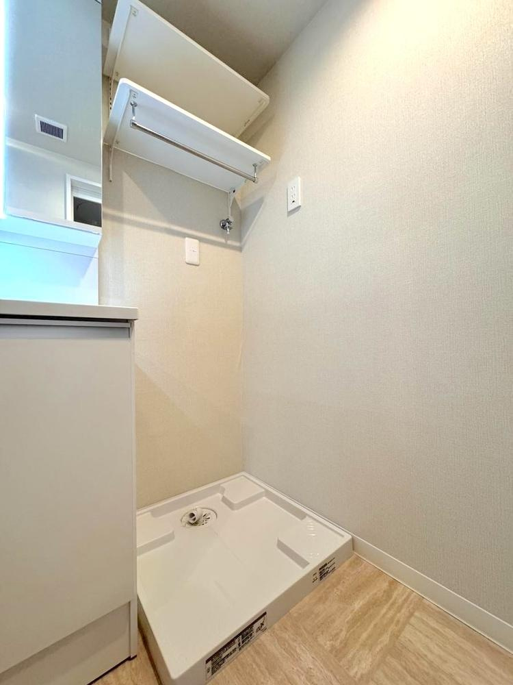 日商岩井草加マンションのランドリースペース|洗濯機置き場です