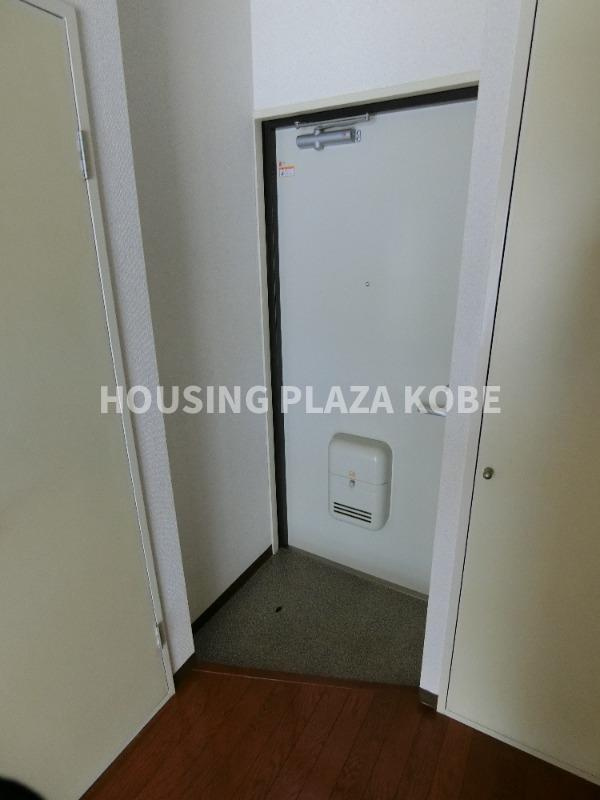 コウジィコート枝吉の玄関