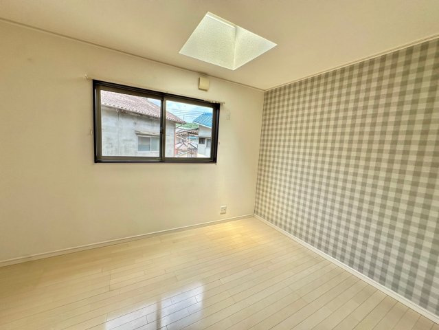 イニジオ・フロンテ北平野南の町の洋室