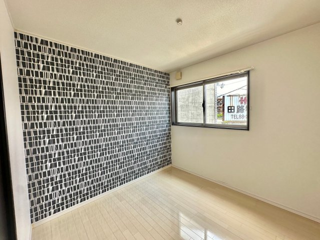 イニジオ・フロンテ北平野南の町の洋室
