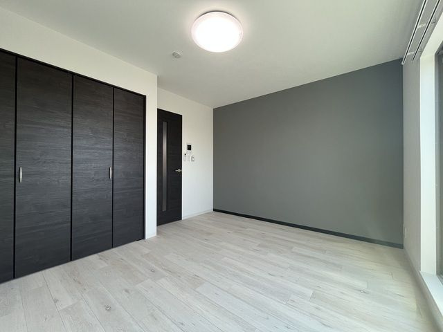 ジーメゾン春日部緑町の洋室