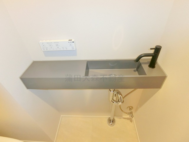 FABRIC蒲田west Residenceのトイレ|トイレの手洗い台