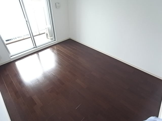 アドバンス神戸プリンスパークの居間・リビング|落ち着いた色調の洋室です