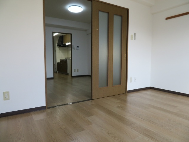 【居間・リビング】 | ベルメゾン石垣西 | 別部屋の写真となります