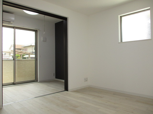 ジーメゾン生駒プレシールの居間・リビング