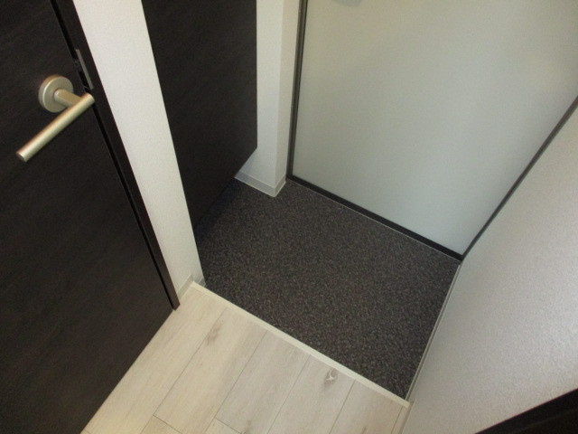 ジーメゾン生駒プレシールの玄関