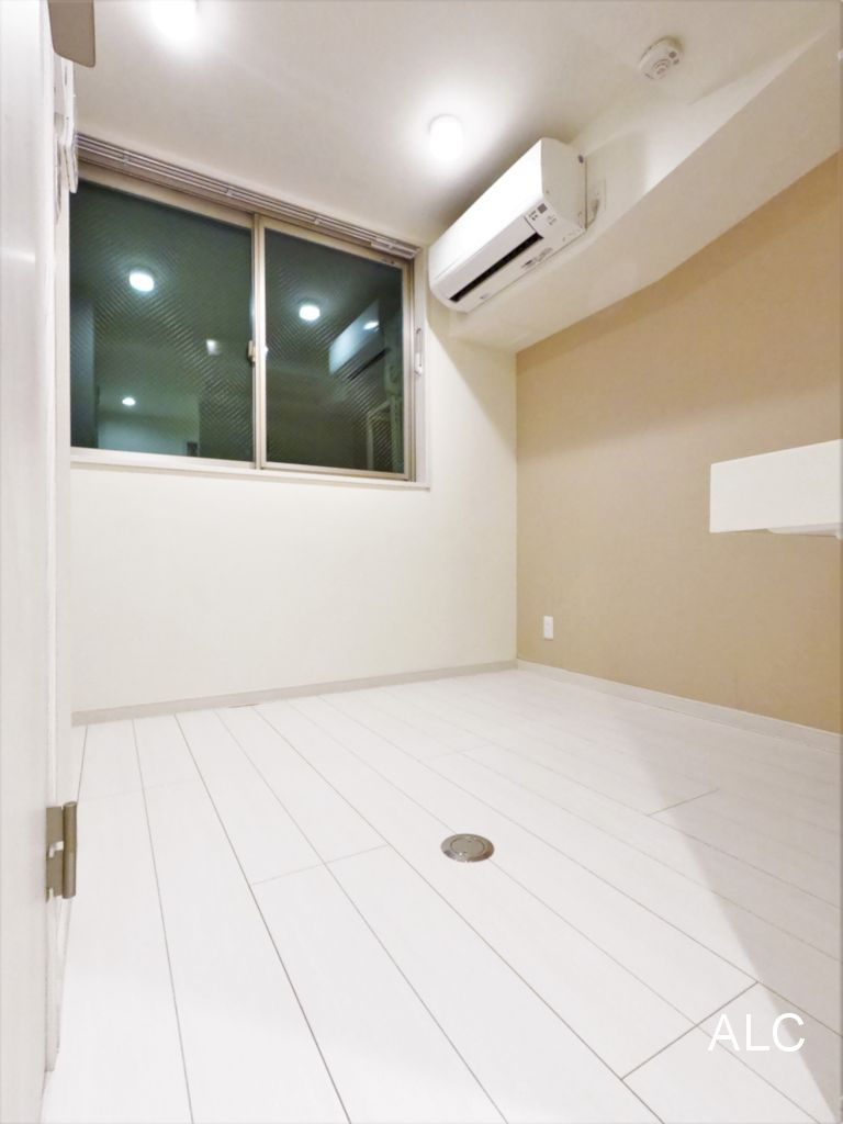 新宿区市谷台町の賃貸マンションの居間・リビング|同仕様