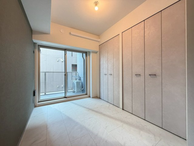 アーバネックス堺筋本町の洋室