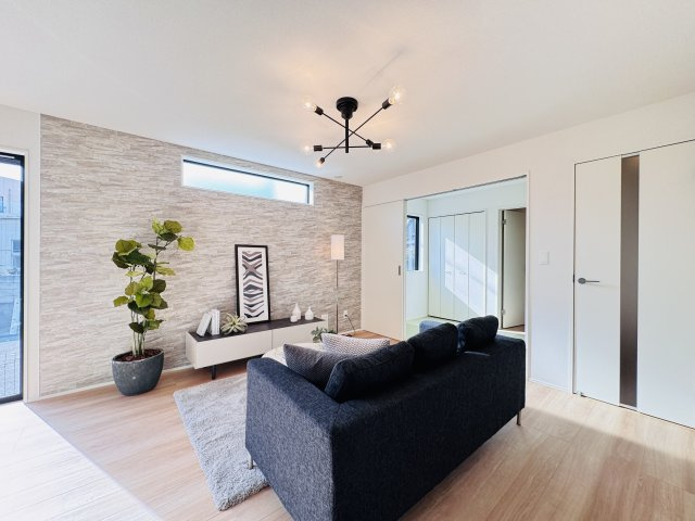 三郷市鷹野５丁目新築戸建【鷹野小学校：8分】の居間・リビング|16帖リビングダイニングキッチン