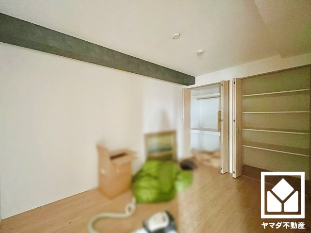 リーデンススクエア宇治伊勢田の洋室