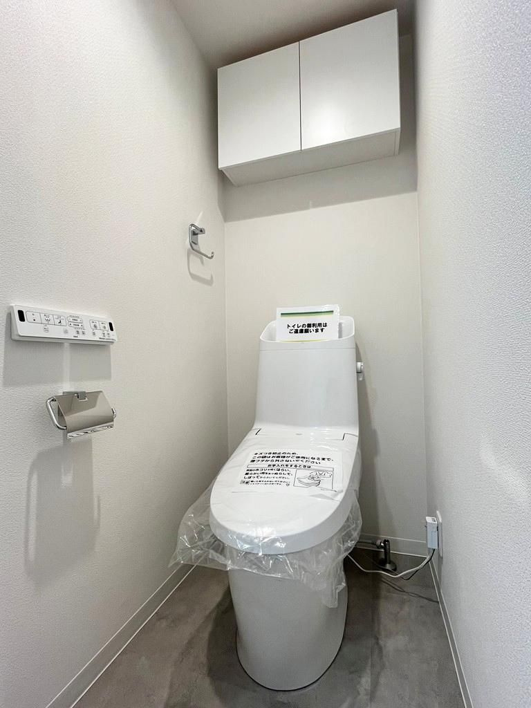 多摩市馬引沢２丁目の中古マンションのトイレ