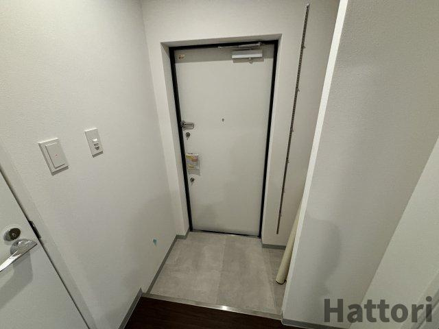 ブロード服部天神駅前レジデンスの玄関