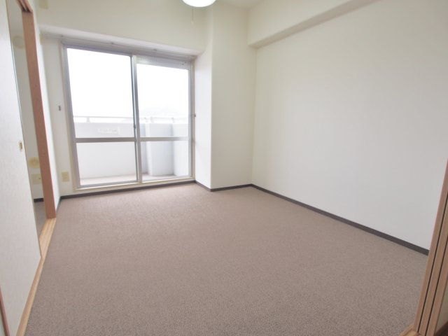 サンヒルズCO-OPマンションの寝室