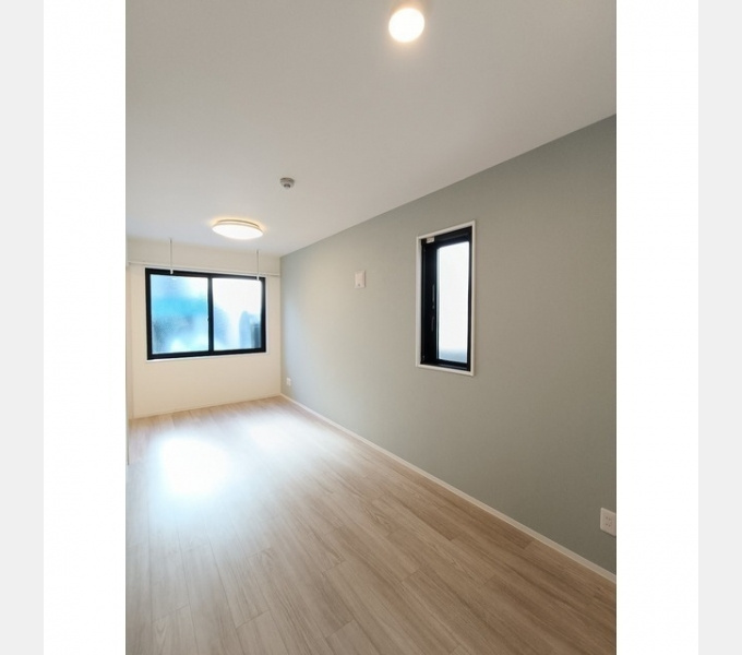 タスキｓｍａｒｔ新大塚Ⅱの居間・リビング