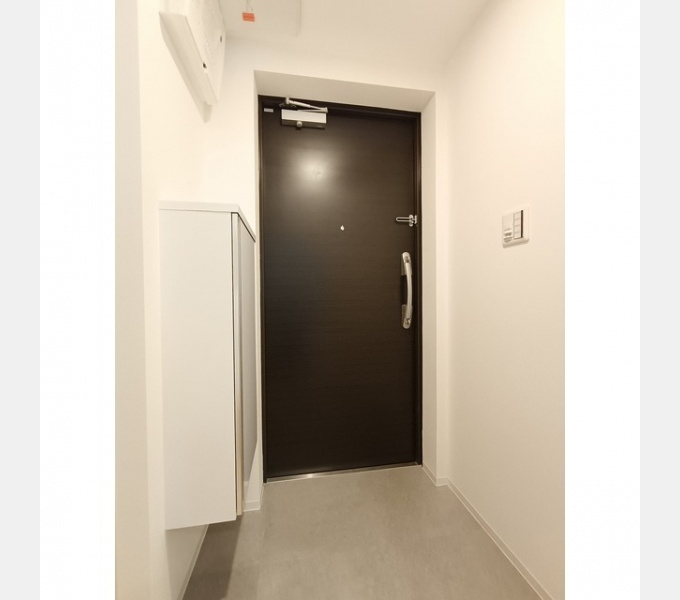 タスキｓｍａｒｔ新大塚Ⅱの玄関