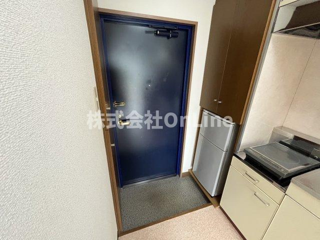 八尾市東本町３丁目の賃貸マンションの玄関