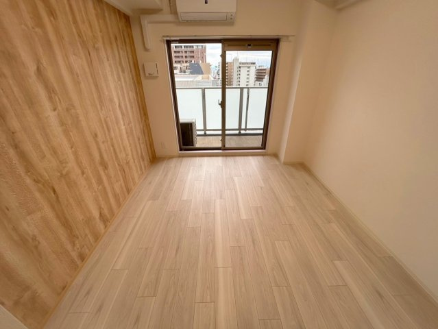 プレサンス東三国駅前グランクラスの居間・リビング