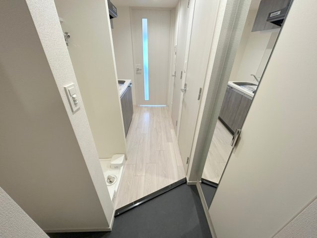 プレサンス東三国駅前グランクラスの玄関