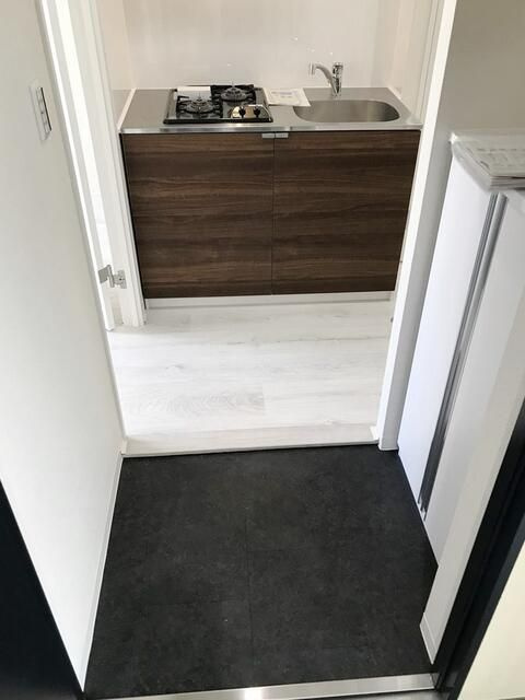 b'CASA Otakebashi Ave.の玄関