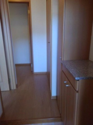 リバーサイドサワナミＣの玄関