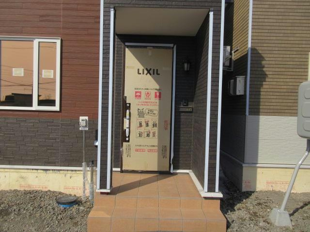 池田町4丁目住宅の玄関