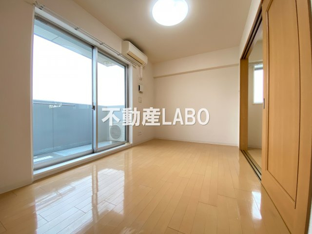 エスカーサ大阪阿倍野パークビューの寝室