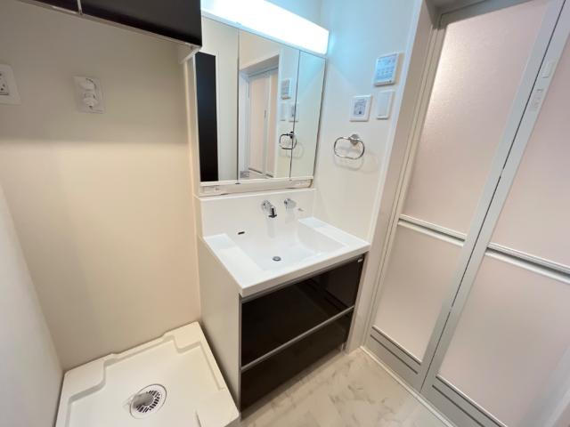 トリコロールⅡの洗面所|洗髪洗面化粧台