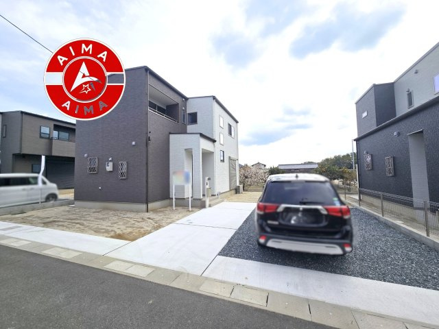 福岡市西区今津第1-12棟（10号棟）の外観|前面道路含む現地の写真です。