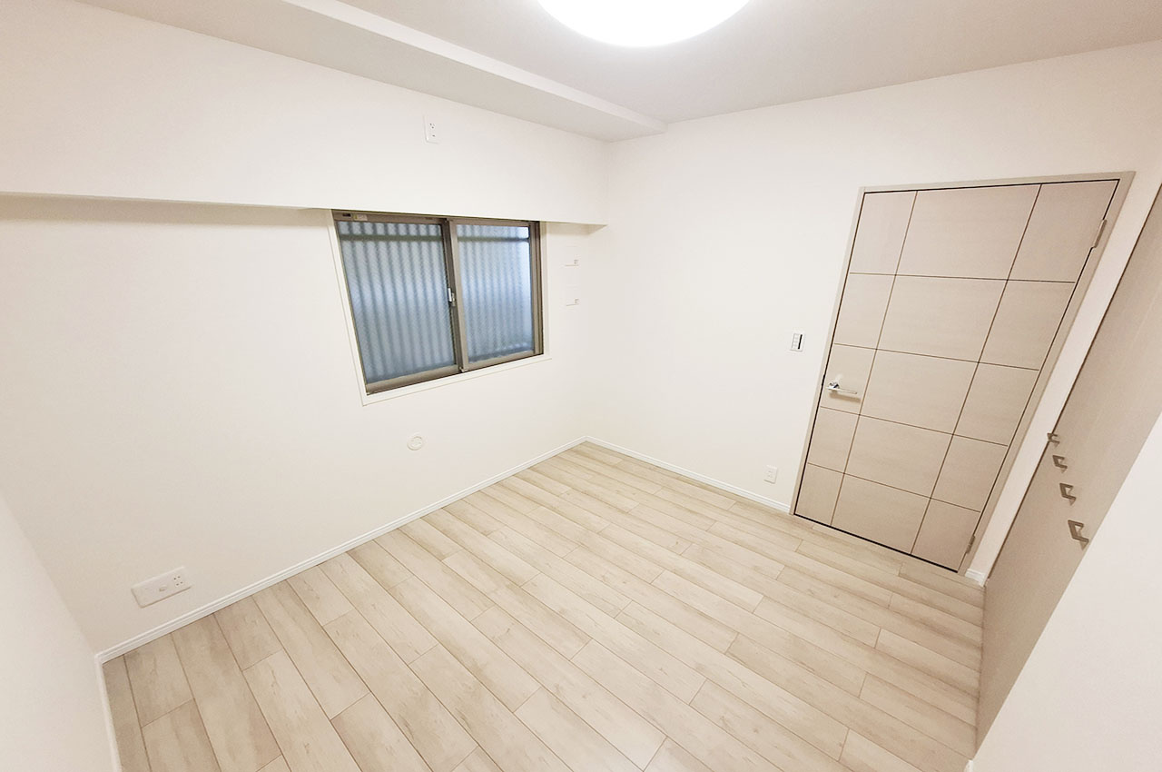 ファミールアクシス泉佐野の寝室|洋室1