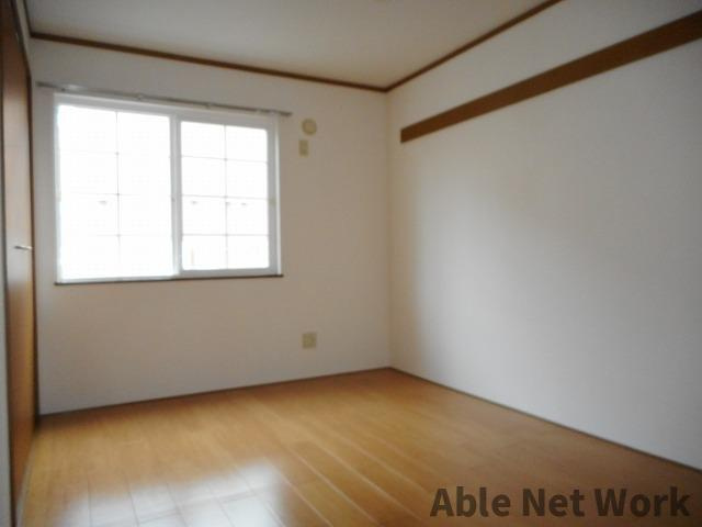 K・レジデンスⅠの居間・リビング|6帖洋室