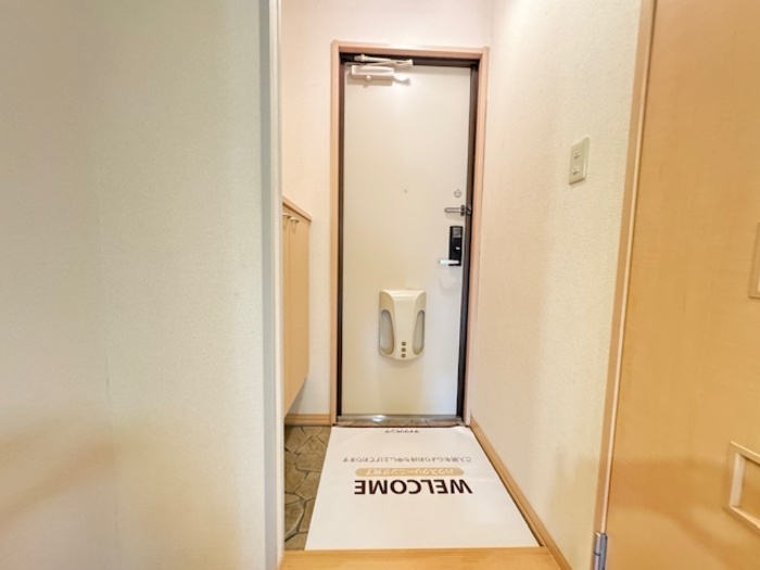 ションセイＡの玄関