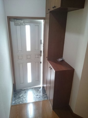 ソフィーナひがし野の玄関