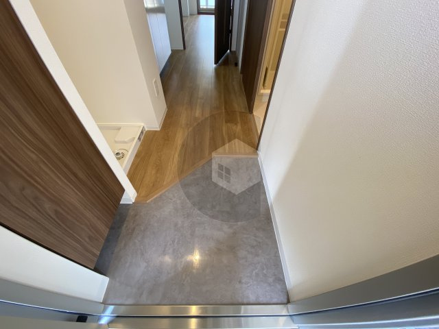 プレサンスNEO長堂アウローラの玄関