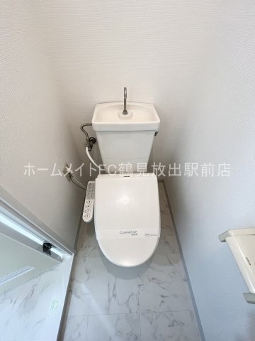 大阪市城東区放出西２丁目の賃貸マンションのトイレ