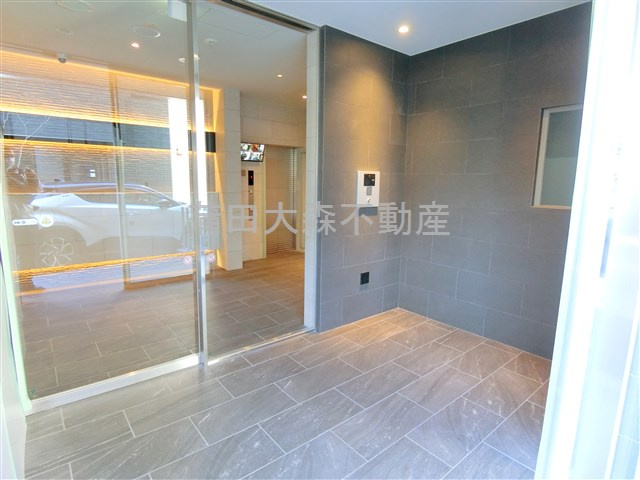 L'axe京急蒲田のエントランス|防犯カメラTVモニター付オートロック宅配BOXメールBOX管理人室