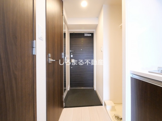 プレサンス玉造ザライブの玄関