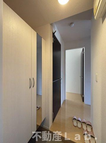 グランソレイユ　A棟の玄関