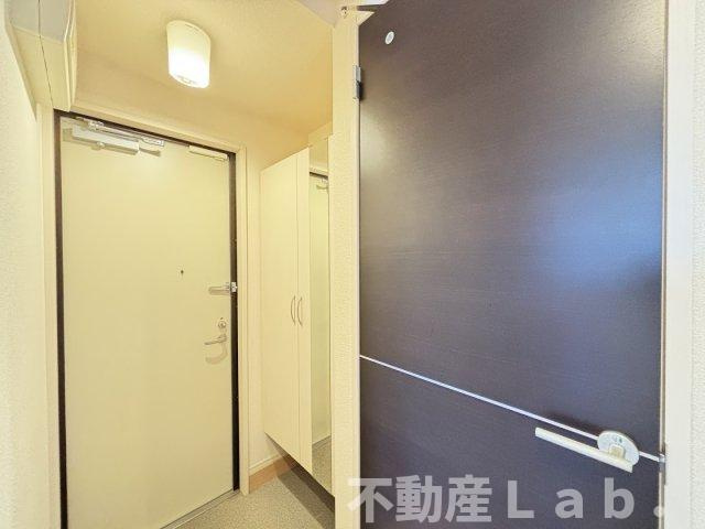 グランソレイユ　A棟の玄関