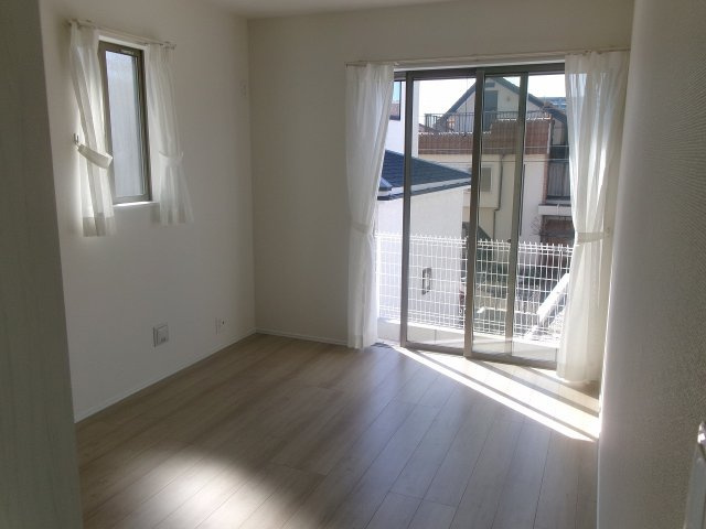 東朝霧丘戸建の寝室