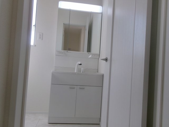 東朝霧丘戸建の洗面所