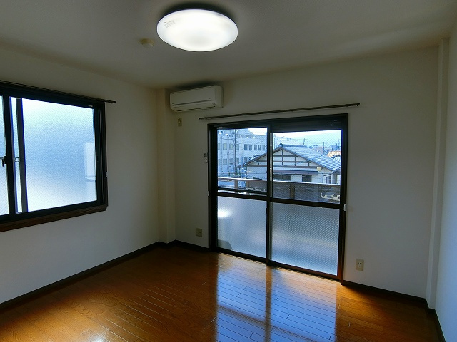 プチメゾン弥生の居間・リビング