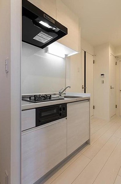 緑3丁目マンションのキッチン|床の色は異なる場合があります