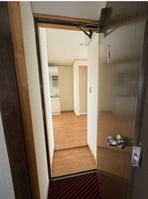 中野区大和町１丁目のアパートの玄関