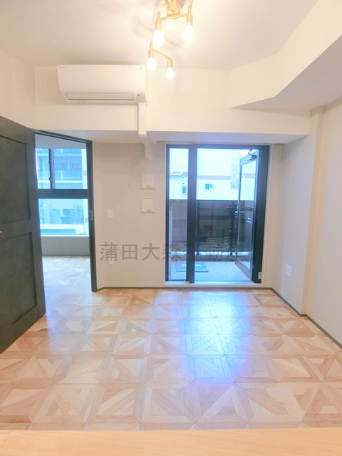 ザ・ライオンズフォーシア蒲田の居間・リビング|LDK10.1帖　カウンターキッチンのリビングダイニングキッチン