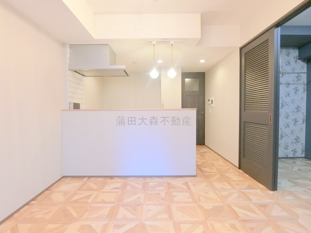 ザ・ライオンズフォーシア蒲田の居間・リビング