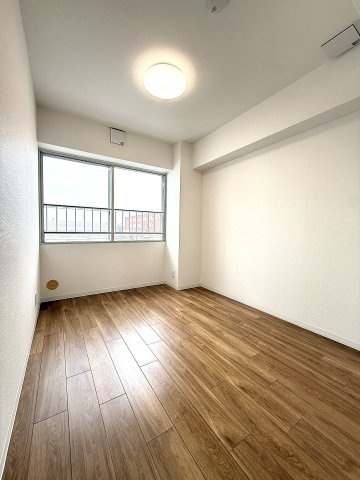 南三十二条グランドハイツの洋室