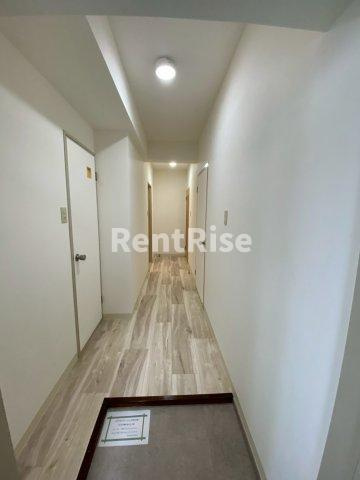 メゾンシャンビラージ多加木の玄関