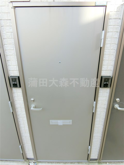 グラシア蒲田の玄関