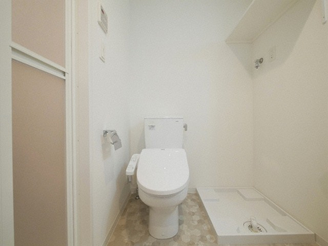 大阪市淀川区木川西１丁目の賃貸マンションのトイレ